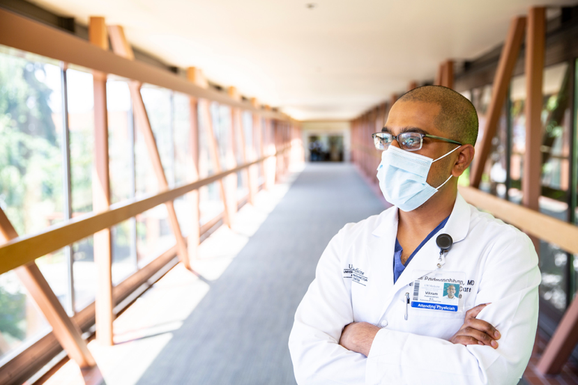 doctor with crossed arms and medical mask