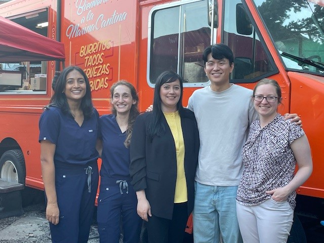 People in front of food truck